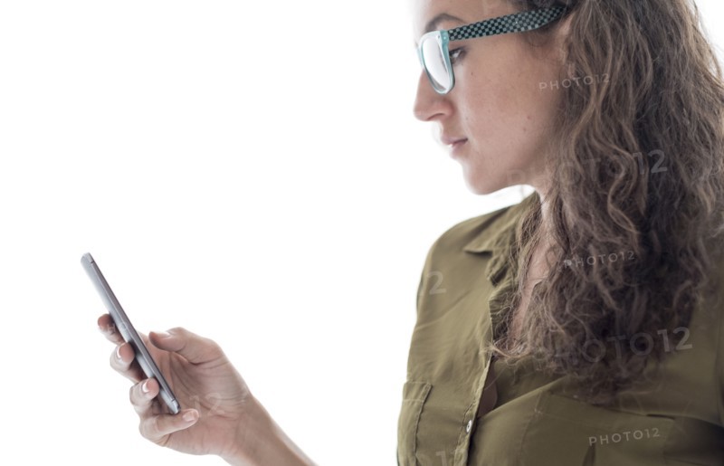 Young woman using smart phone.