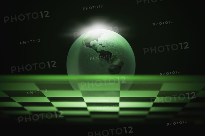 Globe on chess board.