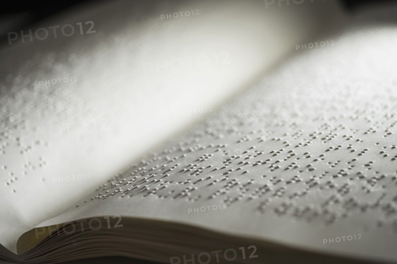 Book with Braille text.