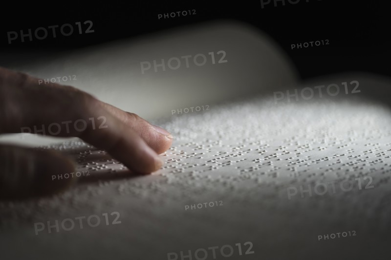 Book with Braille text.
