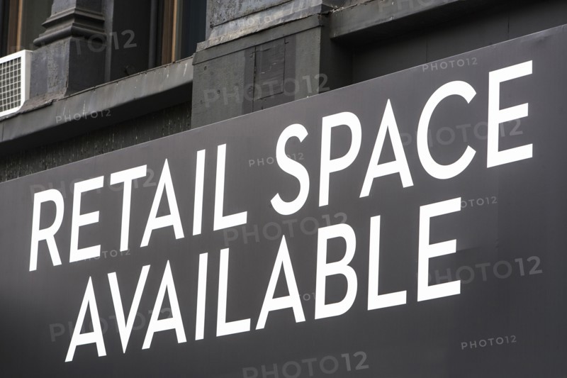 Close-up view of rental sign on building facade