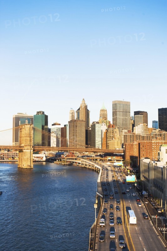 USA, New York State, New York City, Manhattan, Franklin D. Roosevelt East River Drive and Brooklyn Bridge at sunset