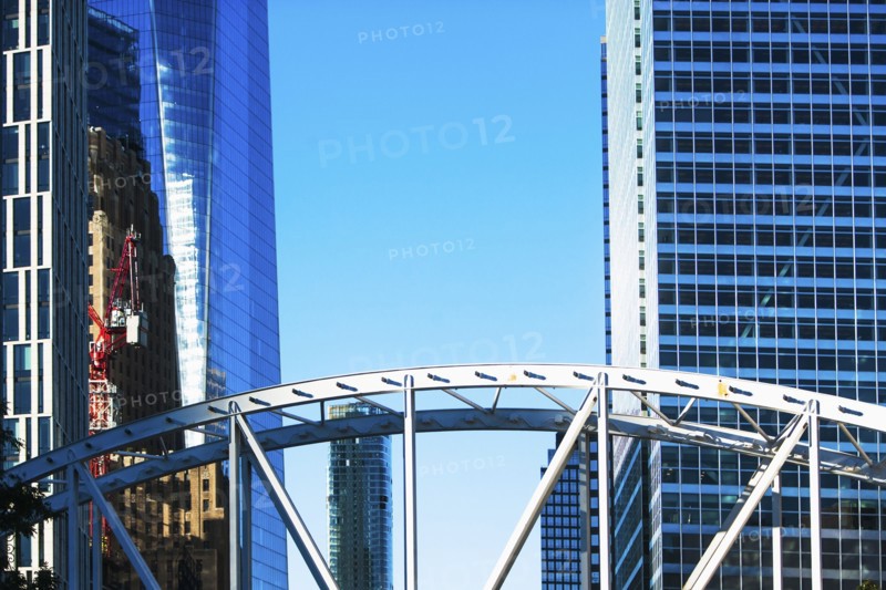 USA, New York State, New York City, Manhattan, Office buildings with bridge in foreground