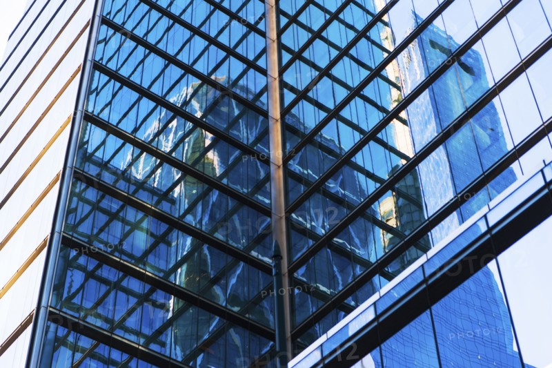 USA, New York, New York City, Glass facade of office building
