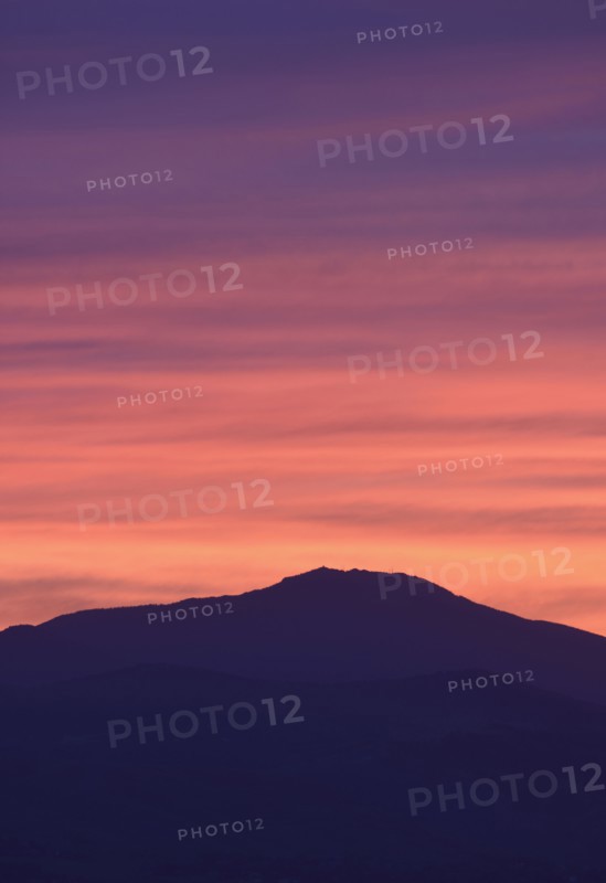 USA, Colorado, Denver, Mountain range with colorful sky at dusk