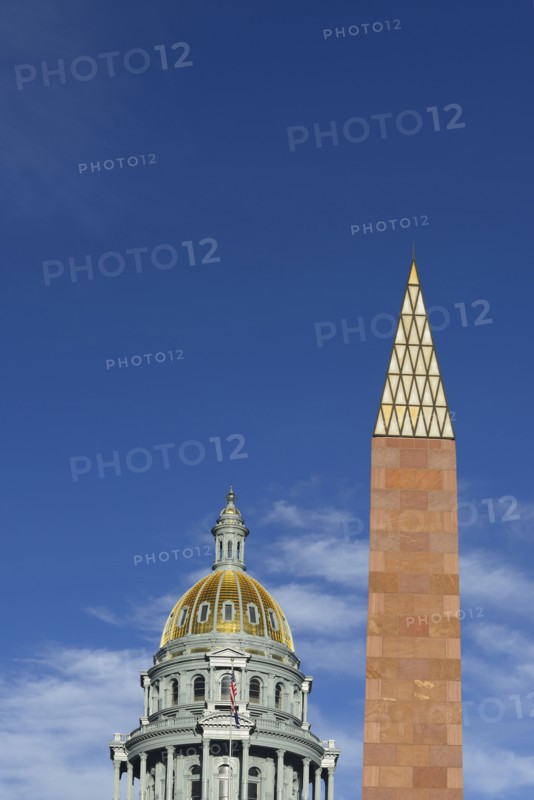 USA, Colorado, Denver, Capitol State building and Veterans monument against blue sky