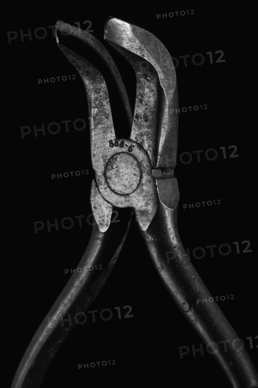 Hand tool against black background