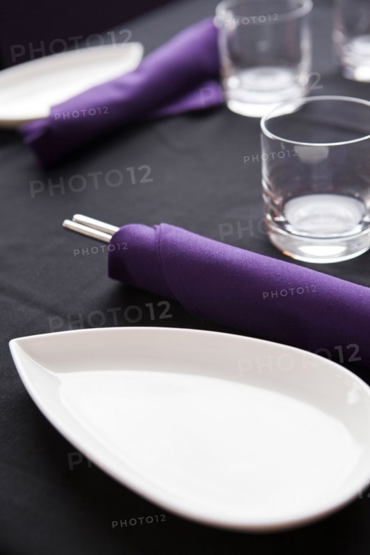 Plates, chopsticks and glasses