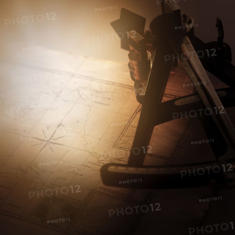 Sextant on old-fashioned map.