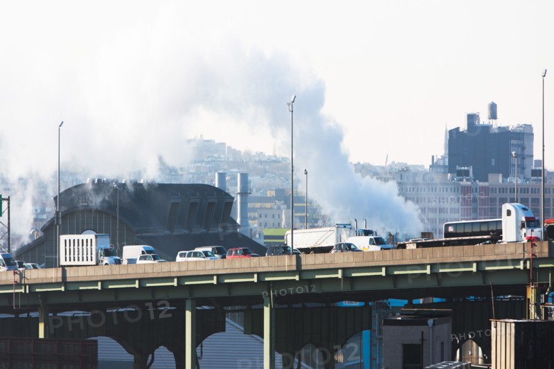 USA, New York, New York City, Smoke over bridge