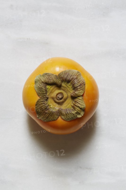 Persimmon against white background