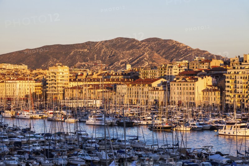 France, Provence-Alpes-Cote d'Azur, Marseille, Vieux port - Old Port with mountain in background