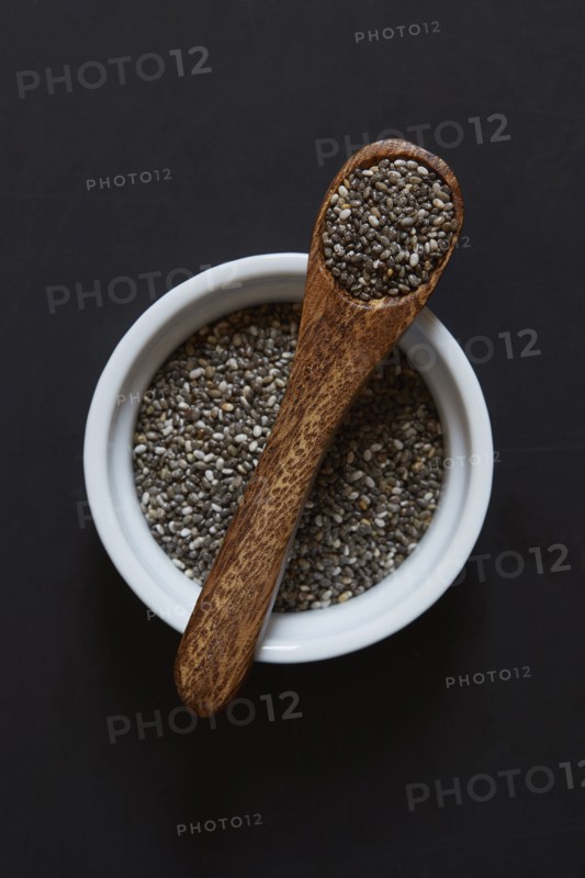 Studio shot of chia seeds in ramekin