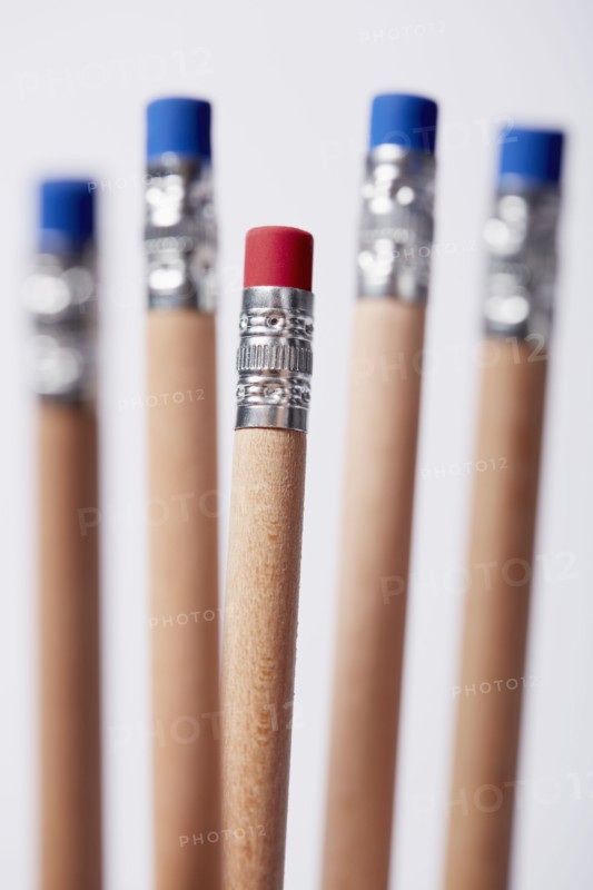 Wooden pencils, one with red eraser