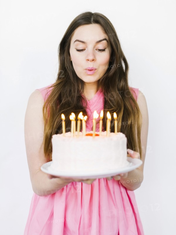 Woman with birthday cake