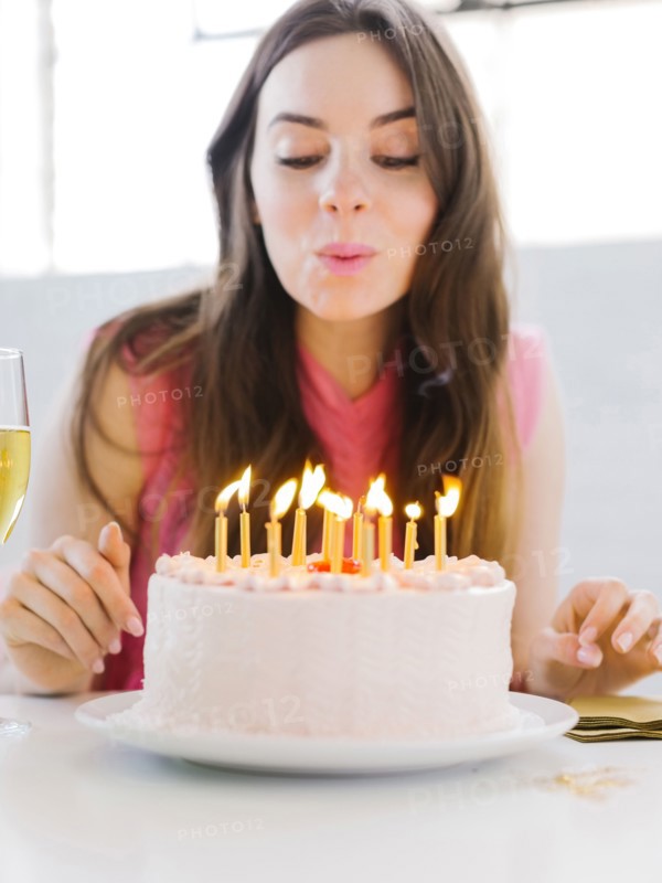 Portrait of woman at birthday party