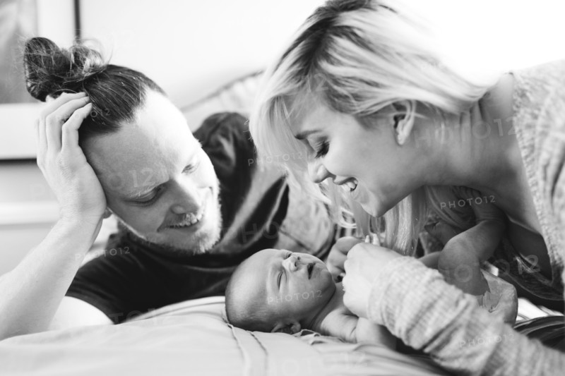 Portrait of parents with newborn boy ( 0-1 months )