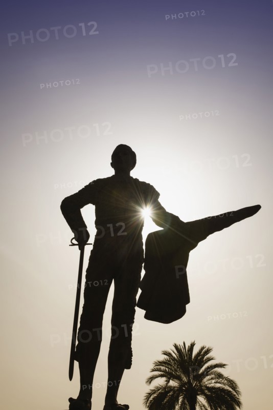 Spain, Seville, Silhouette of statue of bullfighter Pepe Luis Vasquez in Plaza de Toros