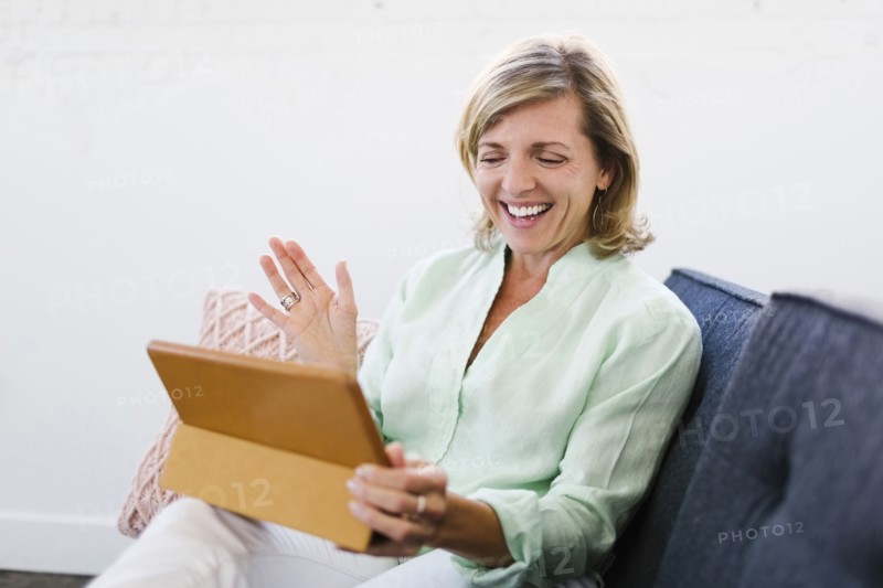 Mature woman using tablet