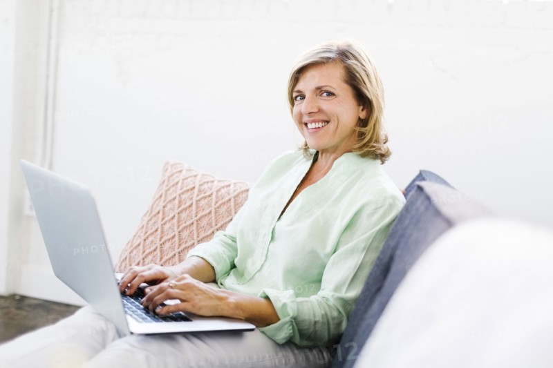 Portrait of Mature woman using computer