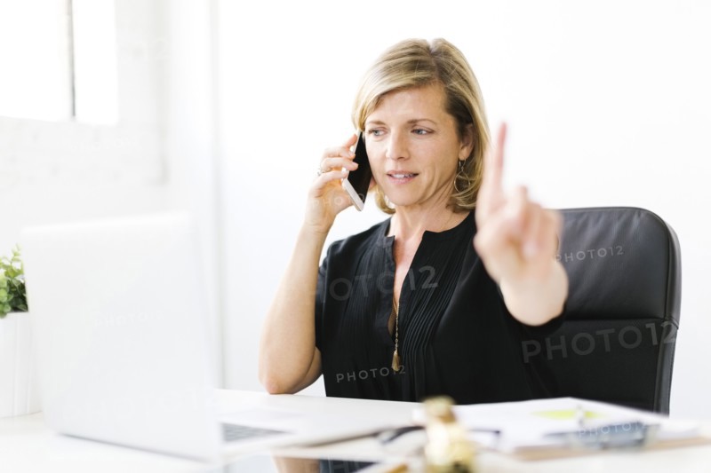 Mature woman talking on mobile phone