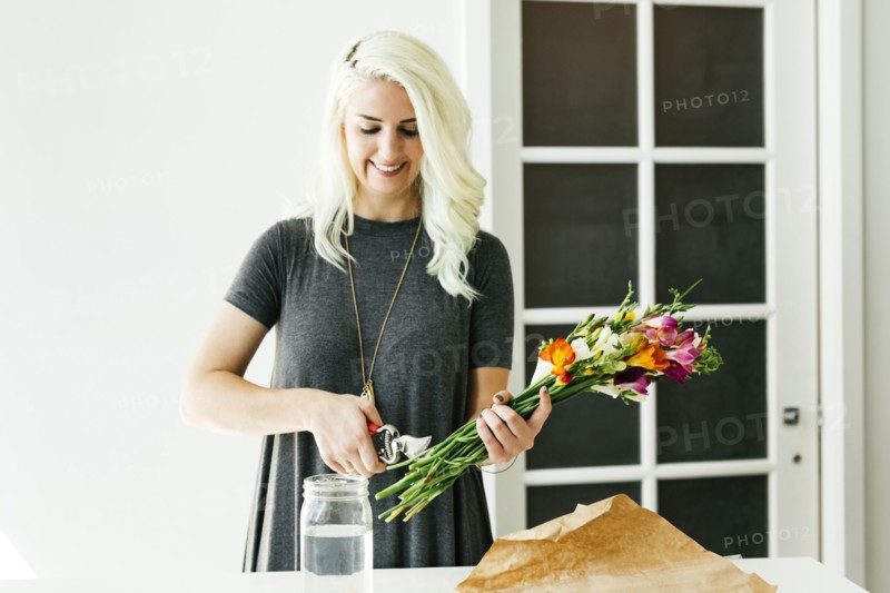 Woman cutting bouquet