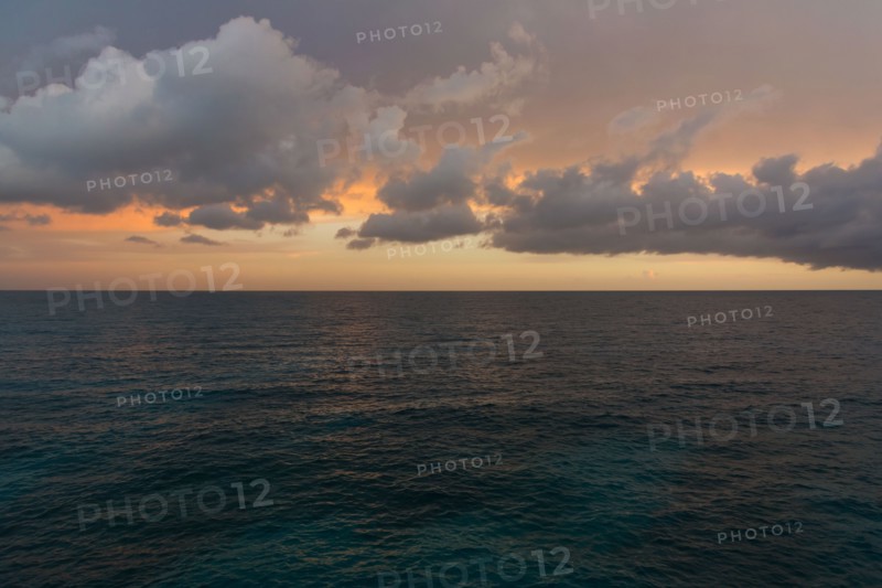 Tranquil seascape in sunset