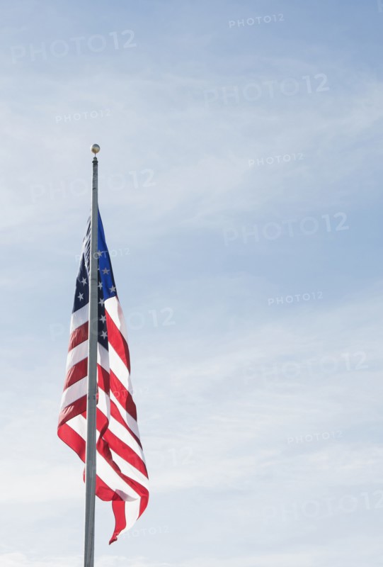 American flag against blue sky