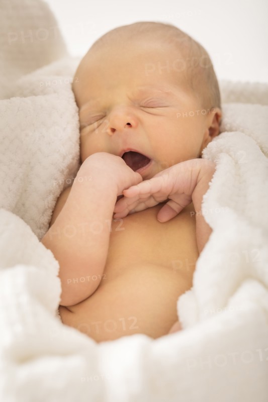 Baby boy (0-1 months) yawning