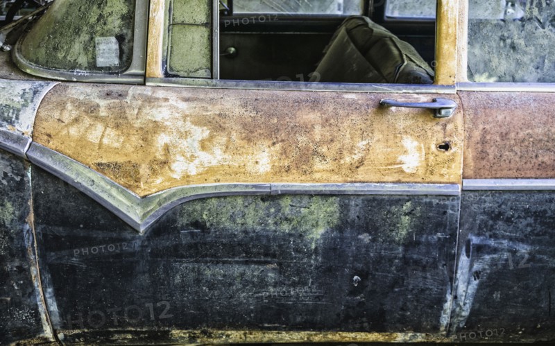 Rusty abandoned car