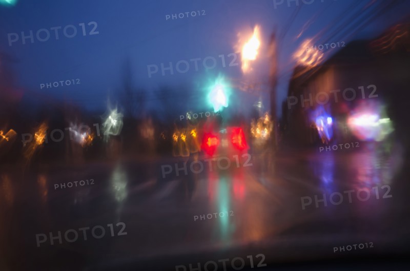 Street traffic at rainy night