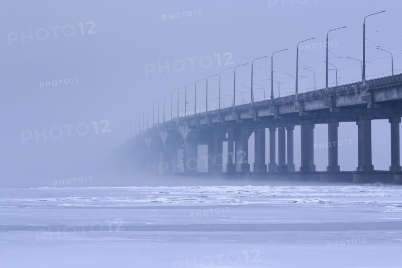 Ukraine, Dnepropetrovsk region, Dnepropetrovsk city, Bridge over frozen river