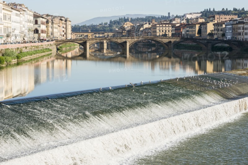 Italy, Tuscany, Florence, Cityscape reflected in Arno river