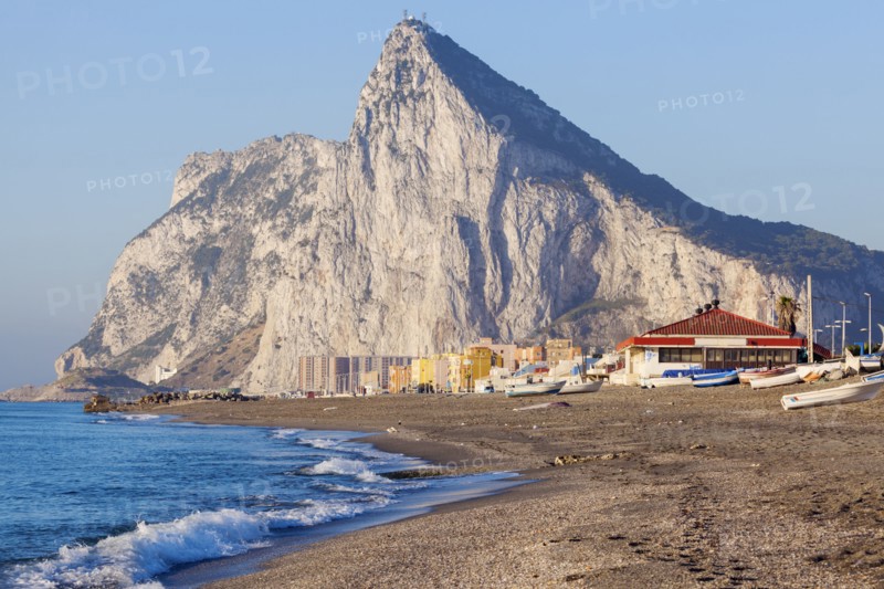 UK, Rock of Gibraltar with sandy beach in foreground