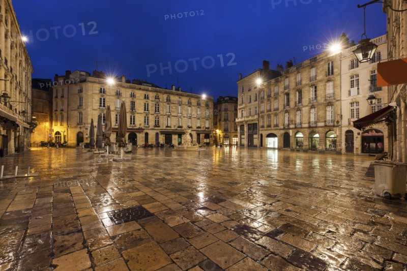 France, Nouvelle-Aquitaine, Bordeaux, Wet Parliament Square at night