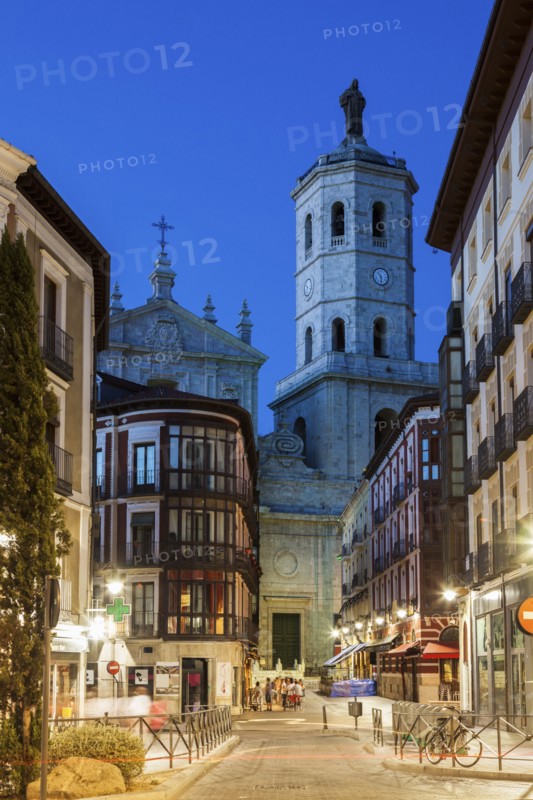 Spain, Castile and Leon, Valladolid, City street with Cathedral of Valladolid in background
