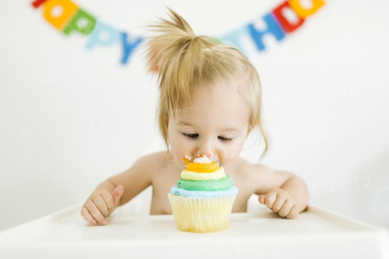 Baby girl (12-17 months) celebrating first birthday