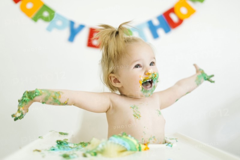Baby girl (12-17 months) celebrating first birthday