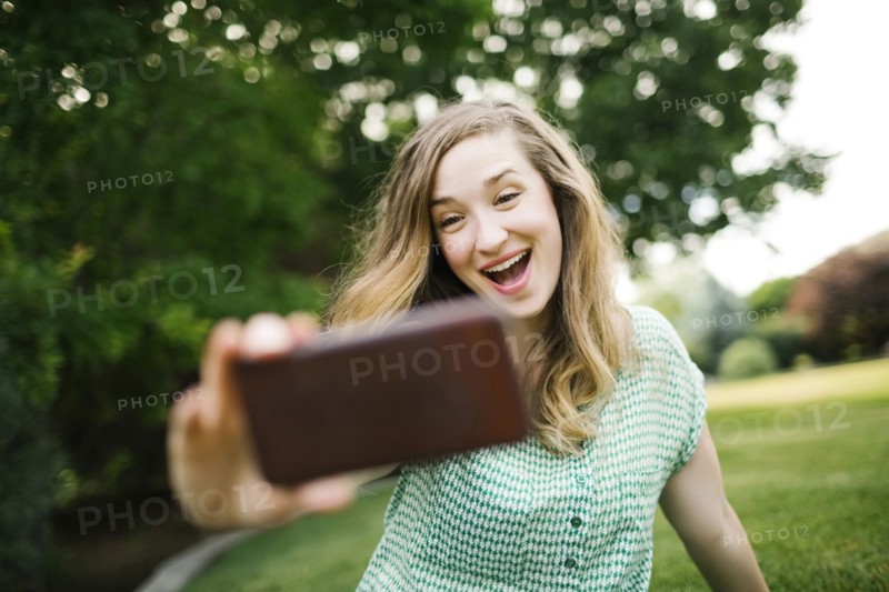 Beautiful woman taking selfie