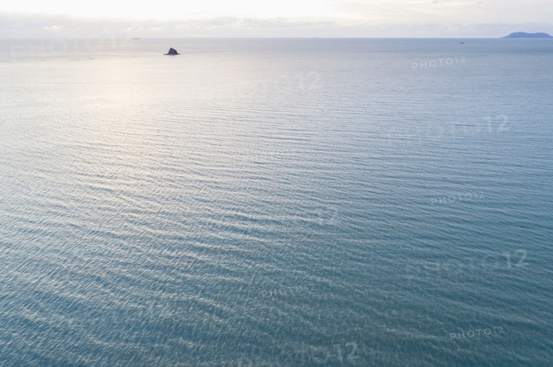 Australia, Queensland, Sea reflecting sunlight