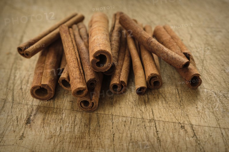 Cinnamon sticks on wooden table