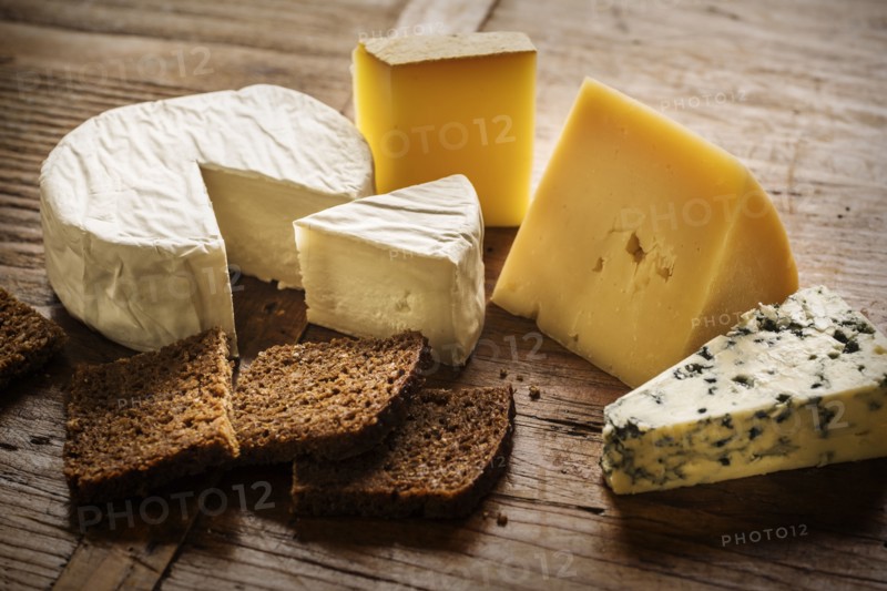 Assorted cheeses and bread slices