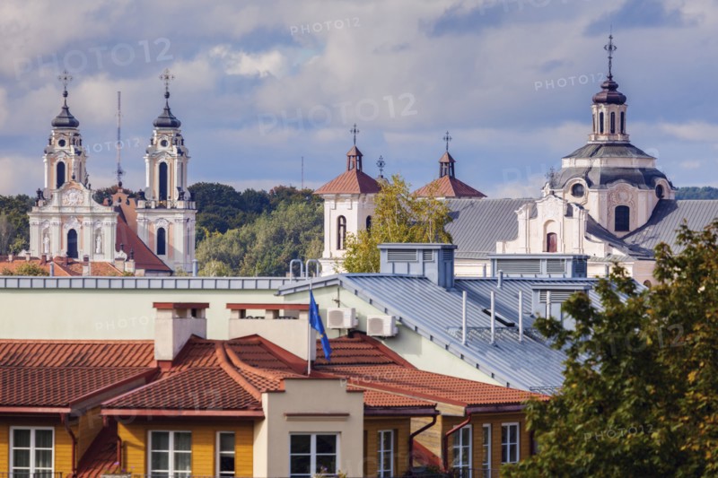 Lithuania, Vilnius, Residential building with churches in background