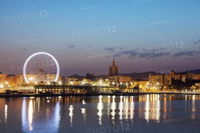Spain, Seville, Andalusia, Waterfront at dusk