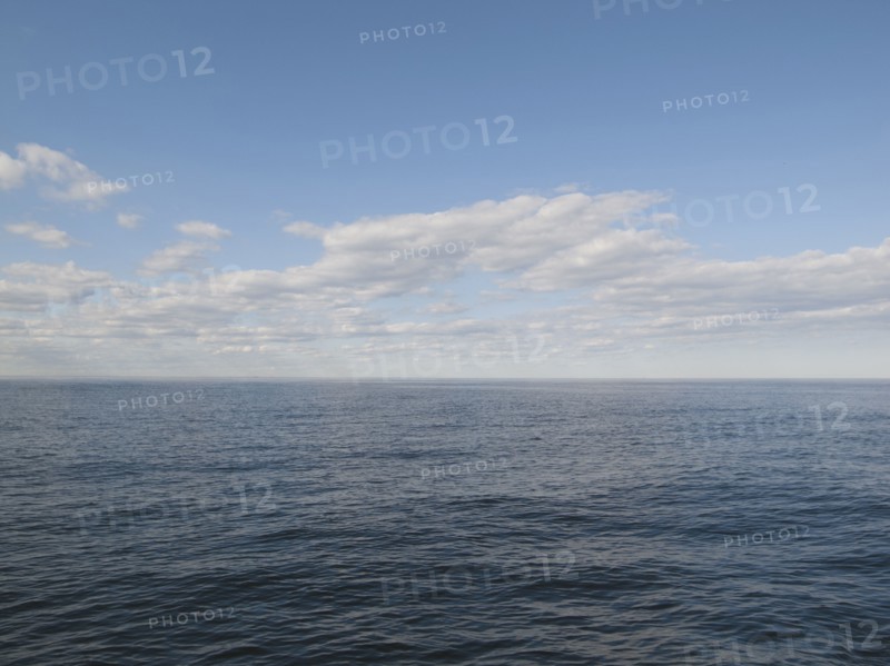 Tranquil sea with sky