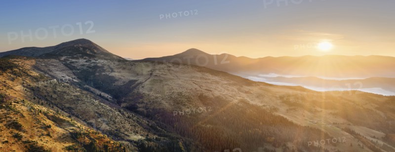 Ukraine, Zakarpattia region, Rakhiv district, Carpathians, Chornohora, Chornohora ridge, mountain Sheshul, Sunrise over mountain range