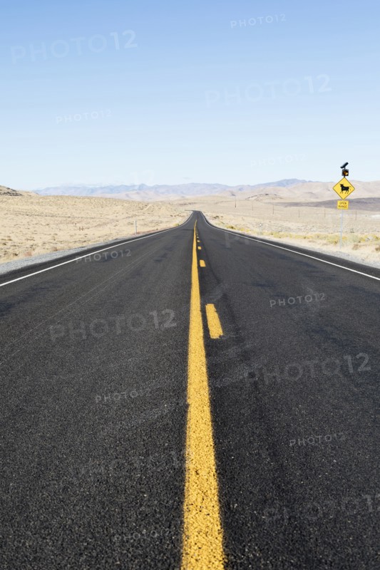 USA, Nevada, Highway 50, Clear sky over empty road