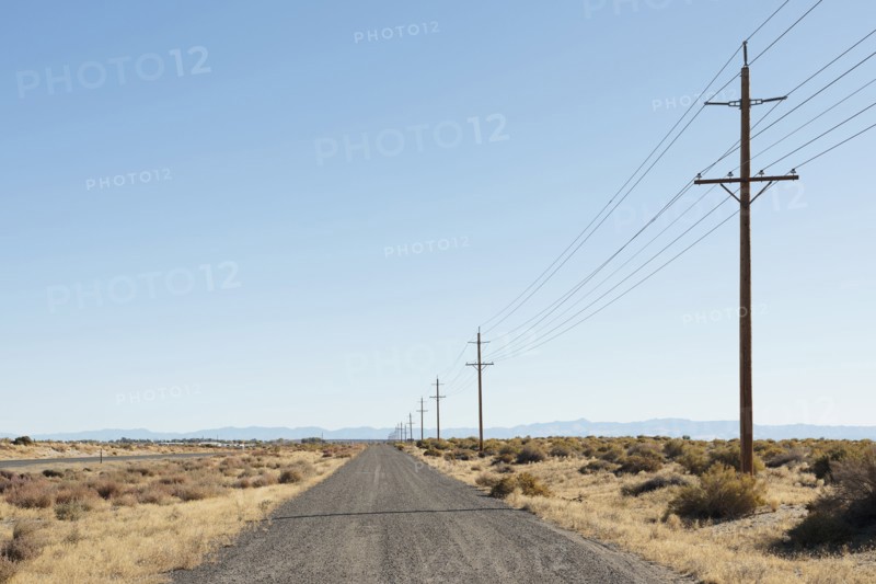 USA, Nevada, Highway 50, Electricity pylons next to road