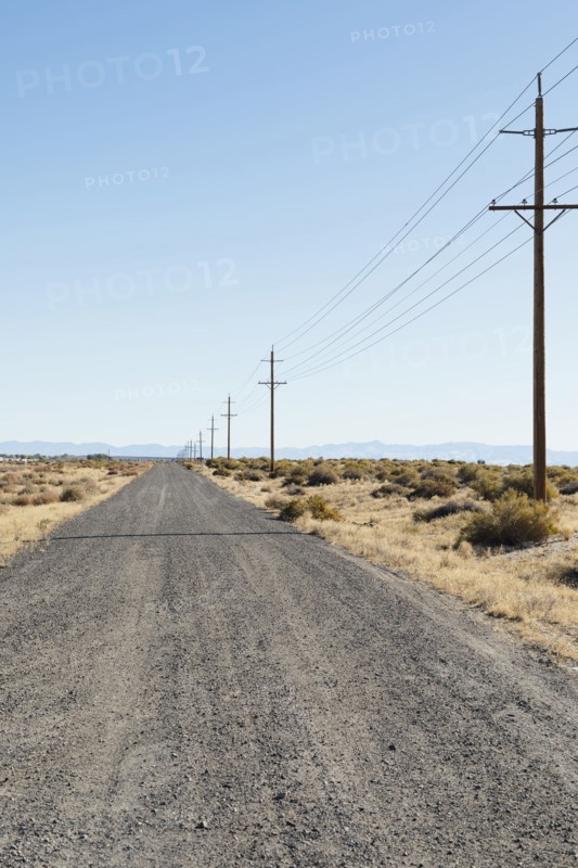USA, Nevada, Highway 50, Electricity pylons next to road