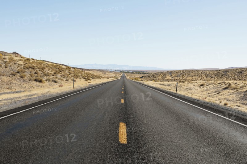 USA, Nevada, Highway 50, Clear sky over empty road